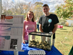 Students presenting research at Oyster Fest